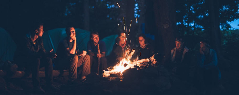 People sitting around a fire